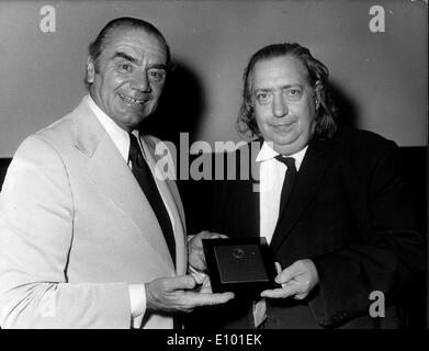 Actor Ernest Borgnine gets award from Henri Langlois Stock Photo