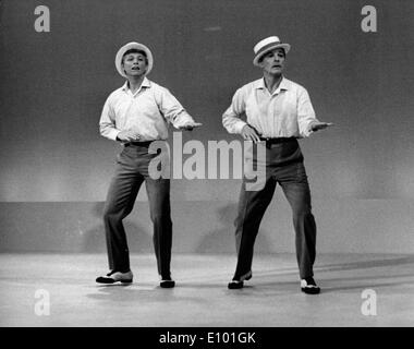 Gene Kelly and Tommy Steele practice for TV Stock Photo