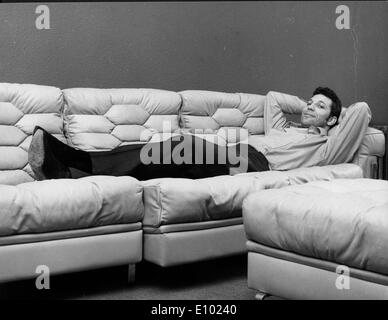 Singer Tom Jones lounges on the couch Stock Photo