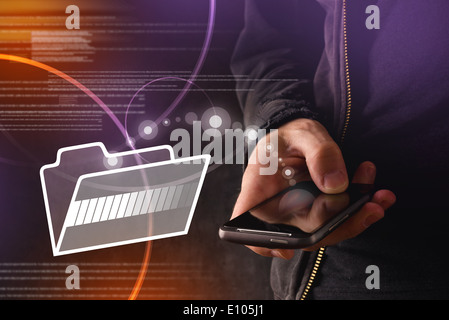 Hand with mobile smart phone transfering files to cloud folder. New technology data backup or file sharing concept. Stock Photo