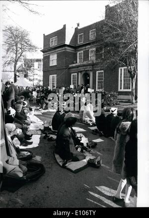 Feb. 02, 1970 - Moslems at Prayer for the festival of Id Ul Adha : Moslems in British joined members of their faith all over the world in celebrating Id Ul Adha (Feast of the Sacrfice), Today members of the faith attended the festival a the Islamic cultural centre in park road, London N.W.l. photo shows The overflow of pilgrims attending today's ceremony at the Islamic cultural centre, sit in the driveway. Stock Photo