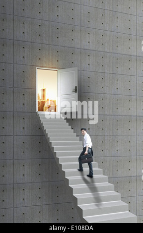 a business man walking up the stairs Stock Photo