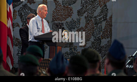 US Vice President Joe Biden speaks to a group of U.S. and Romanian service members May 20, 2014 in Bucharest, Romania. Biden is in Romania to reassure allies of the US commitment to the region. Stock Photo