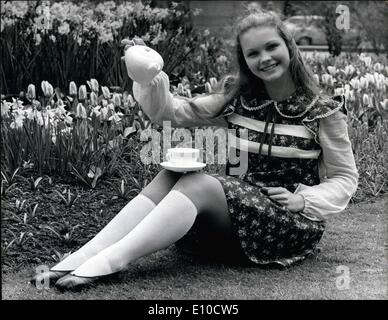 Apr. 04, 1972 - Alice Role For Fiona Fiona Fullerton, 15, happily looks into the mirror in London yesterday after the announcement that she is to play the little role in Josef Shaftel's film ''Alice's Adventures in Wonderland'' A pupil at Elmhurst Ballet School, Camberley, Surrey, she has already appeared in two films ''Run Wild, Run Free'' and ''Nicholas and Alexandra' Stock Photo