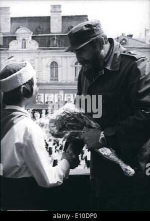 May 05, 1972 - A girl presents flowers to Fidel Castro of Cuba during the festive procession in Sofia in honour of the day of the Slav script, Bulgarian culture and Bulgarian press. Stock Photo