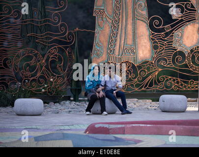 May 20, 2014 - Tehran, Iran - An Iranian couple sit in the Water and Fire park in northern Tehran. (Credit Image: © Morteza Nikoubazl/ZUMA Wire/ZUMAPRESS.com) Stock Photo