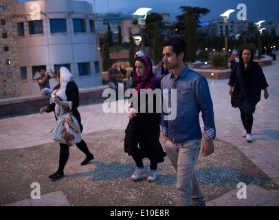 May 20, 2014 - Tehran, Iran - An Iranian couple walk in the Water and Fire park in northern Tehran. (Credit Image: © Morteza Nikoubazl/ZUMA Wire/ZUMAPRESS.com) Stock Photo