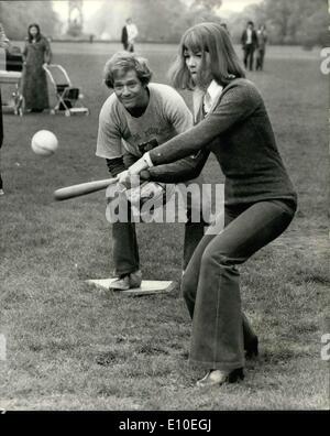 May 11, 1972 - Actress Glenda Jackson takes up American Baseball: Scenes were being shot in Hyde Park today filming sequences for the new Melvin Frank film ''A touch of Class'', which started production this week. One of the film sequences being shot was a group of Americans playing a baseball game in which Glenda Jackson, (making her screen romantic comedy debut) and her co-star George Segal took part. Photo shows with George Segal behind Glenda Jackson makes a strike during the baseball game today. Stock Photo