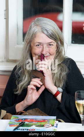 Classicist Professor Mary Beard in her signature red coat, filming BBC ...