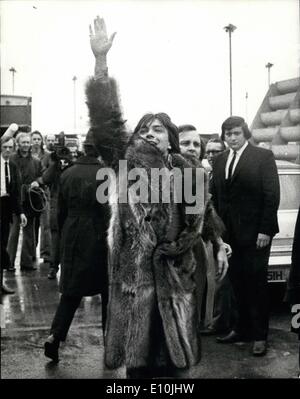 Mar. 03, 1973 - Pop Fans Flock To London Airport To See Pop Idol David Cassidy Fly Home To America: Pop idol David Cassidy who has been suffering from fatigue and flu after his appearances in Britain, flew back to America today. Photo shows David Cassidy waves to the fans as he left London Airport by air for America today. Stock Photo