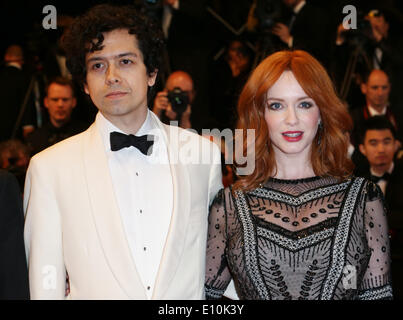 US actress Christina Hendricks and her husband Geoffrey Arend (l) arrive for the premiere of the movie 'Lost River' at the 67th annual Cannes Film Festival, in Cannes, France, 20 May 2014. The movie is presented in the section Un Certain Regard of the festival which runs from 14 to 25 May. Photo: Hubert Boesl/dpa - NO WIRE SERVICE Stock Photo