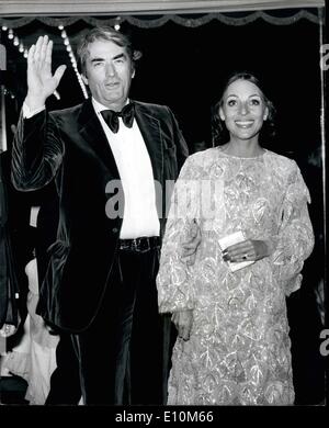 Jun. 06, 1973 - Premiere of the new James Bond film ''Live and Let Die'': Princess Anne last night attended the royal premiere of the new James Bond film ''Live and Let Die'', at the Odeon, Leicester Square, London. Photo shows Actor Gregory Peck and his wife, seen arriving for the premiere last night. Stock Photo