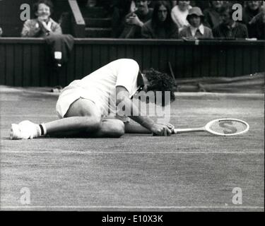 Jul. 07, 1974 - Wimbledon tennis Championships Newcombe (Australia) is beaten by Rosewall (Australia). Photo shows John Newcombe slips on the court during his match against fellow Australian Ken Rosewall on the center court today. Stock Photo