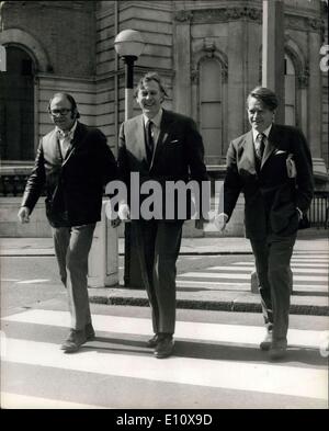 May 06, 1974 - 20th. Anniversary Of First Four-Minute Mile: 20 years ago today, Roger Bannister became the first man to run a mile in less than four minutes, and to celebrate the occasion. Dr. Roger Bannister, now Chairman of the Sports Council, together with Chris Brasher and Christopeer Chataway, who took part in the historic race twenty years ago, appeared on the BBC Radio 4 programme Start the Week, with Richard Baker. Photo shows (L to R): Chris Brasher, Roger Bannister and Chris Chataway arriving for today's broadcast. Stock Photo