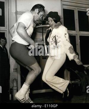 Nov. 11, 1974 - American Heavyweight Boone Kirkman Trains for His Fight With Joe Bugner Under the Critical Eye of Fiancee. American Heavyweight, Boone Kirkman who fights Britain's Joe Bugner, European Champion, at the Royal Albert Hall, next Tuesday December 3, was in training with the assistance of his fianc&eacute;e Gloria Ballestrasse, who always accompanies him at the gym. He was training today at the Thomas a' Beckett Gym, Old Kent Road, South East London. OPS: Gloria joins her fianc&eacute; Boone Kirkman in some skipping exercise during training at the gym today. Stock Photo