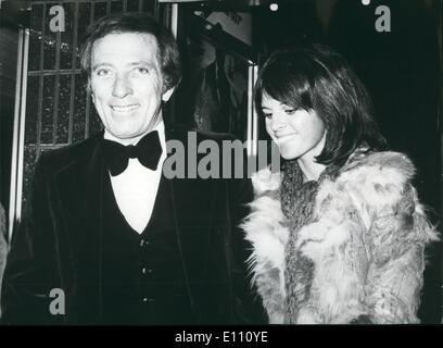 Dec. 12, 1974 - Andy Williams and wife at Premiere of latest James Bond film: American singer Andy Williams and his wife, Claudine, pictured at last night's Royal Charity premiere at the Odeon, Leicester Square, of ''The man with the Golden gun'' - the latest James Bond film starring Britain's Roger Moore. Stock Photo