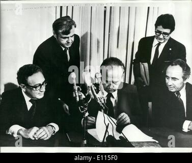 Sep. 09, 1975 - Israeli Prime Minister initials the Israel - Egypt interim peace agreement. Photo shows Yitzhak Rabin, the Israeli Prime Minsiter, initialling the Israel - Egypt Interim Agreement in Jerusalem, watched by the negotiator, Henry Kissinger (left) Stock Photo
