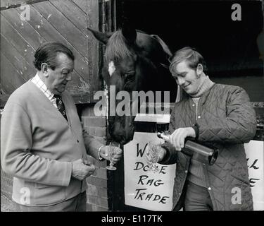 Apr. 04, 1976 - Rag trade joins victory party: The sweet small of success after clearing all the fences at Aintree, the Grand National winner Rag Trade was entitled to an appreciative sniff at a sunday morning glass of champgne at Kinnersley, Weros. His stable companions helping to celebrate his victory on Saturday were Fred Rimell, left, his trainer, John Burke the jockey who rode him over the jumps. Stock Photo