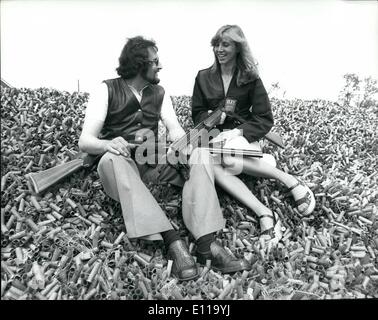 May 22, 1976 - May 22nd 1976 The Sporting Championships of Great Britain. The husband and wife event in the Sporting Championships of Great Britain took place yesterday at the West London Shooting grounds at Northolt, Middx. Photo Shows: Mr. and Mrs. Florent sit on a mountain of spent cartridges after taking part in the Sporting Championships at Northolt yesterday. Stock Photo