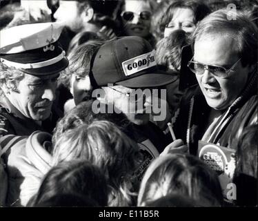 Nov. 08, 1976 - 10,000 fans hail James Hunt - Britain's new world motor racing champion at brands hatch: James Hunt, Britain's new world motor racing champion was besieged by young autograph hunters yesterday when 10,000 fans turned up at Brands Hatch, the circuit where he started his career, to say ''Thank you''j to his supporters. Niki Lauda was also present to pay tribute to James who took the title from him in Japan. Photo shows ex-world champion Niki Lauda is besieged by fans when her turned up at Brands Hatch to pay tribute to the new world champion, James Hunt, yesterday. Stock Photo