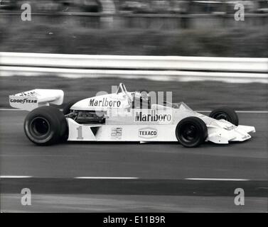 Nov. 11, 1976 - 10,000 Fans Hail James Hunt - Britain's New World Motor Racing Champion at Brands Hatch: James Hunt, Britain's new world motor racing champion, was besieged by young autograph hunters yesterday when 10,000 fans turned up at Brands Hatch, the circuit where he started his career, to say ''thank you'' to his supporters. Niki Lauda was also present to pay tribute to James who took the title from him in Japan. Photo shows James Hunt out on the circuit at Brands Hatch yesterday in his Marlboro-Mclaren M26, the car he will drive next year. Stock Photo