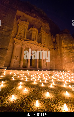 Lamps lit in front of Al Khazneh, (the Treasury), for the Petra by Night show, Petra, Jordan Stock Photo
