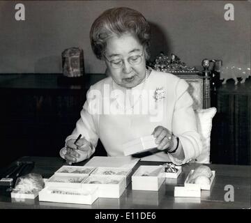 Mar. 03, 1977 - Empress Nagako's birthday Japan's Empress Nagako looks at specimens of sea shell in room at Tokyo's Imperial Palace in this photo made recently and released Saturday in Tokyo by the Imperial Household Agency. The empress celebrates her 74th birthday March6. Stock Photo