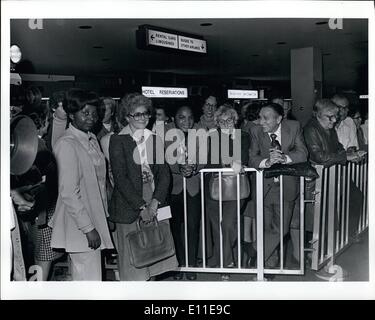 Sep. 09, 1977 - Friday, 9-23-77 Kennedy Int. Airport, New York City. Supporters, including her sister Mary Ellen McLaughlin (left, foreground holding bag) awaiting the arrival of Maryknoll sister Janice McLaughlin who was recently released from a Rhodesia jail. Stock Photo