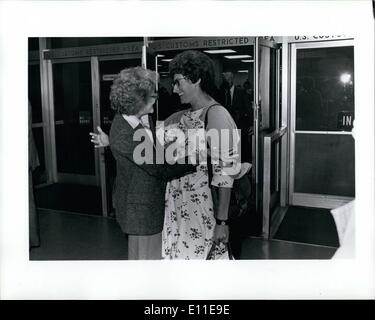 Sep. 09, 1977 - Friday Sept 9, 1977 Kennedy International Airport N.Y.C. Mary Knoll Sister Janice McLaughlin, right, being greeted on her arrival to New York by her sister, Mary Ellen McLaughlin of Manhattan. sister Janice was recently released from a Rhodesian Prison. Stock Photo