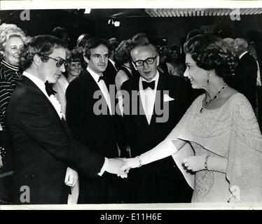 Mar. 03, 1978 - The Queen Attends Premiere of 'Close Encounters of the Third Kind' Last night the Queen attended the film premiere at the new highly acclaimed 'Close Encounters of the Third Kind'. 5 year old Cary Guffey from Georgia who in the film is kidnapped by aliens from space, presented the Queen with a bouquet. Richard Dreyfuss who is the star of the film was also present to meet the Queen. Photo Shows: The Queen shakes hands with American actor Richard Dreyfuss, star of the film 'Close Encounters of the Third Kind', at the Odeon Leicester Square last night. Stock Photo