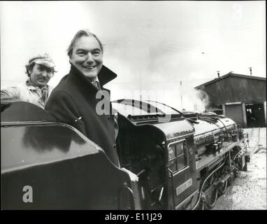 Apr. 04, 1978 - British Rail Chief Goes Steam. British Rail Chairman Peter Parker flew by helicopter to Dover today. He was taken to see and travel on the Romney, Hythe, and Dymchurch Light Railway, where he inaugurated what is believed to be the World's first buffet car on any such narrow gauge railway. Photo shows: British Rail Chairman Peter Parker at the controls of the steam engine with the driver Peter Smith when he visited Dover today. Stock Photo