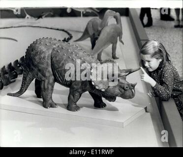 Oct. 17, 1979 - ''Dinosaurs and Their living relatives'' Exhibition Laura Polk, aged 8, examining a model of a horned triceratops, an 18ft long rhinoceros -like ornithischian dinosaur, on view in a new permanent exhibition, ''Dinosaurs and their living Relatives'', which opened yesterday at the Natural History Museum. The glass - fiber models are up to one -Fifth life size. Stock Photo