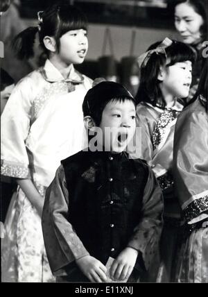 Feb. 06, 1981 - Schoolchildren celebrate the Chinese New Year the year of the rooster; Hundreds of schoolchildren from London and the Home Counties, attended a ceremony at the Commonwealth Institue, Kensington High Street today to celebrate the Chinese New Year The year of the Rooster. Photo Shows A big yawn from this little chinese boy as he watches the celebration for the Chinese New Year The year of the Rooster at the Commonwealth Institute today. Stock Photo