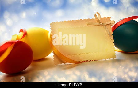 Easter eggs with yellow ribbon Stock Photo
