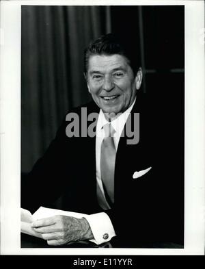 Jan. 20, 1981 - President Ronald W. Reagan posed behind his desk for his first picture in the Oval Office of the White House. One of this firsts acts was the light the National Christmas tree that was kept dark because of the hostage situation. Th hostage situation ended today when Iran released the 52 persons. Stock Photo
