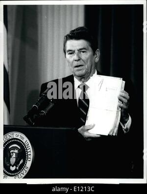 Oct. 01, 1981 - Reagan speaks out on Awacs sale: President Ronald W. Reagan shown as he led a press conference from the east room of the White House Today, holds stacks of papers that he says are causing delays in Government decisions. These 318 pages have been condensed to 6 pages that do the same job. The chief executive also said that it is not the business of other nations to makes U.S. Foreign policy. This is in reference to Israel's objections to the awacs planes to Saudi Arabia. Stock Photo