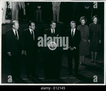 Oct 08, 1981 - Washington, District of Columbia, U.S. - President Ronald W.Reagan (at podium) as he addressed the nation to eulogize the late president Anwar Sadat of Egypt. Sadat was assassinated October 6th in Cairo while reviewing a parade. shown left to right in this historic picture are: Former president Gerald R. Ford; Former president Richard M. Nixon; (president Reagan); And former president Jimmy Carter. At right are Mrs.Jimmy Carter and Mrs.Ronald Reagan. The four men will be part of the U.S. Delegation attending the funeral for the slain leader. Stock Photo