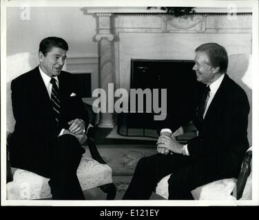 Oct. 10, 1981 - Reagan Meets With Jimmy Carter: Washington, D.C.: President Ronald W. Reagan (left) meets with former P[resident Jimmy Carter in The Oval Office today. The two men met for more than thirty five minutes to discuss world matters, President Carter announced that he was Supporting Reagan on the AWACS sale of planes to Saudia-Arabia. Carter was one of three ex-presidents with represented the U.S. at the Anwar Sadat funeral in Cairo on Saturday. Stock Photo