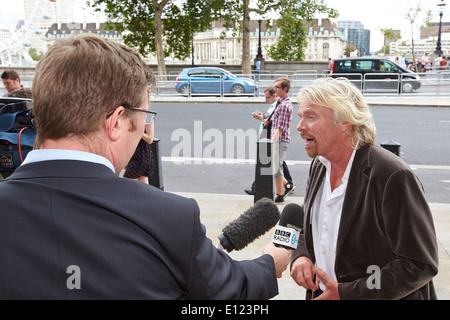 Sir Richard Branson arrives at the Houses of Parliament ahead of giving evidence to the Transport Select Committee Stock Photo