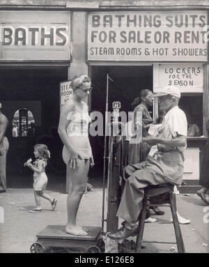 Nov 19, 2007 - New York, New York, USA - Coney Island merchant weighs gilr in bikini Stock Photo