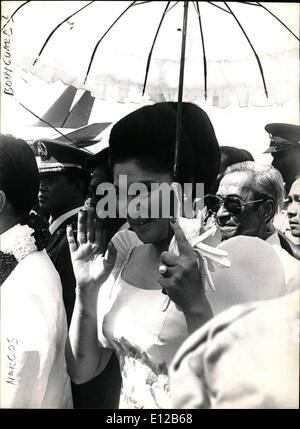 Dec. 09, 2011 - Philippines Ã¢â‚¬â€œ Mrs. Imelda Marcos, wife of President Marcos pictured here in Nairobi with a shady parasol Stock Photo