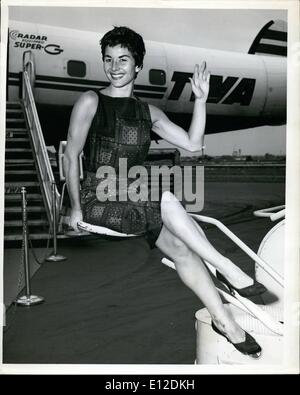 Dec. 19, 2011 - Idlewild Airport, New York, shapely Tybee Afra, dancer, was caught by the photographer offering a farewell have Stock Photo