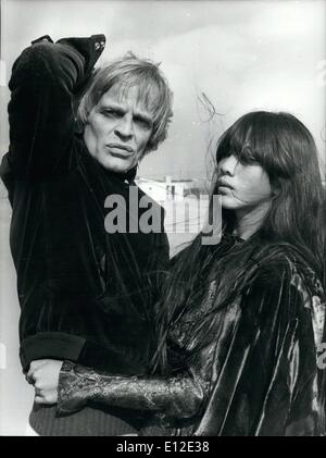 Dec. 20, 2011 - Third Marriage, for the German Actor Klaus Kinski. The Bride is the young Vietnamese Min Hoi, 21, from Saigon. She is daughter of a Vietnamese woman and a French. She has never done of the cinema. Blonde Kalus, who is the good protagonist of many Italian Ã¢â‚¬Ëœwestern' and is well known, after his marriage will play the role of the famous American Writer Edgard Allan Poe. OPS: The two fianc&eacute;es seen at the Fregen Beach. Stock Photo