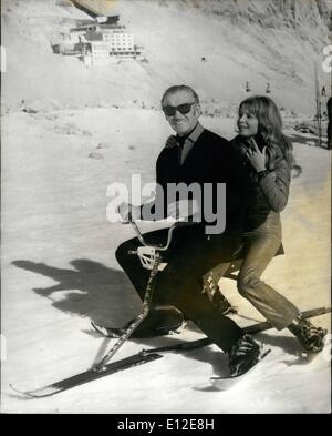 Dec. 15, 2011 - David Niven On Location On Germany's Highest Mountain: David Niven is co-starring with Gina Lollobrigida in a new film called ''King-Dane-Knave'' currently being made in Munich. Photo Shows The popular star on location on the summit of the ''Zugspitze'' - Germany's highest mountain in a scene which requires not only acting ability (of which Mr. Niven has already given sample proof) but the additional skill of managing ski-bike. His partner on an afternoon's frolicking in the snow is lovely German actress, Christine Schubert. Stock Photo