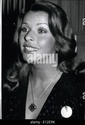 Dec. 15, 2011 - 12th German Jewel - day in Munich - Senta Berger Elected to ''Lady Diamond'': Nearly ''priceless''. Is Senta Berger as she is to see here! The film star was elected at the 12th German jewel - day in Munich and got for that, so to speak as a kind of ''letter of appointment'', a gold - brooch with a brilliant. For a short time ''Lady'' Senta was allowed to decorate herself with the most expensive stone of this exhibition, the 104carat ''Deepdene'', which costs ca. 2.5million marks. Photo shows Senta with the two pieces of jewellery. Stock Photo