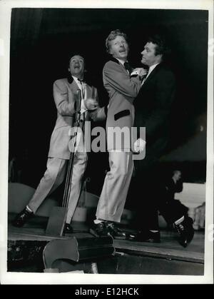 Jan. 04, 2012 - Stars become ''Teddy Boys'' for charity shows. Mills - Kaye - Olivier trio.: Screen stars John Mills - Danny Kaye and Laurence Olivier were to be seen in ''Teddy Boy'' outfits at the London Palladium this afternoon rehearsing for he parts they are to take in the ''Night of 100 Stars'' Charity Show to be held there at Midnight tomorrow. Photo shows left to right: John Mills; Danny Kaye and Laurence Olivier on the stage at the London Palladium this afternoon. Stock Photo