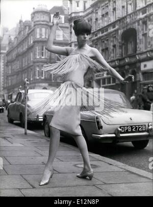 Feb. 24, 2012 - Not for use before february 11th. 1965: Spring styles by Mattli dress with the swirling skirt. Photo shows Model Rosemary Wilkins wears a pale turquoise fringe dress which has a charming swirling skirt - from the Mattli spring collection. Stock Photo