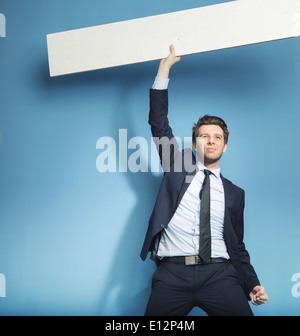 Successful handsome man with the empty board Stock Photo