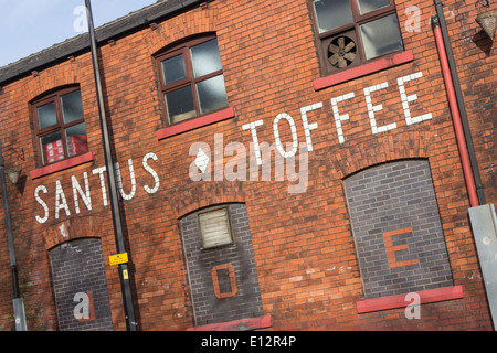 'Santus Toffee' makers of  'Uncle Joe's Mint Balls', set in brickwork on the Santus Sweets factory on Dorning Street, Wigan. Stock Photo