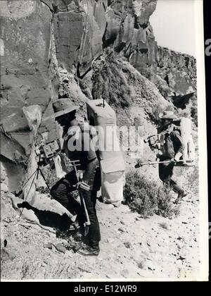 Feb. 26, 2012 - Apollo 16 Geology Training. Astronauts John W. Young, left, and Charles M. Duke, prime crewmen for the Apollo 16 lunar landing mission, study geology and train for their lunar surface extravehicular activity at Taos, New Mexico. Stock Photo